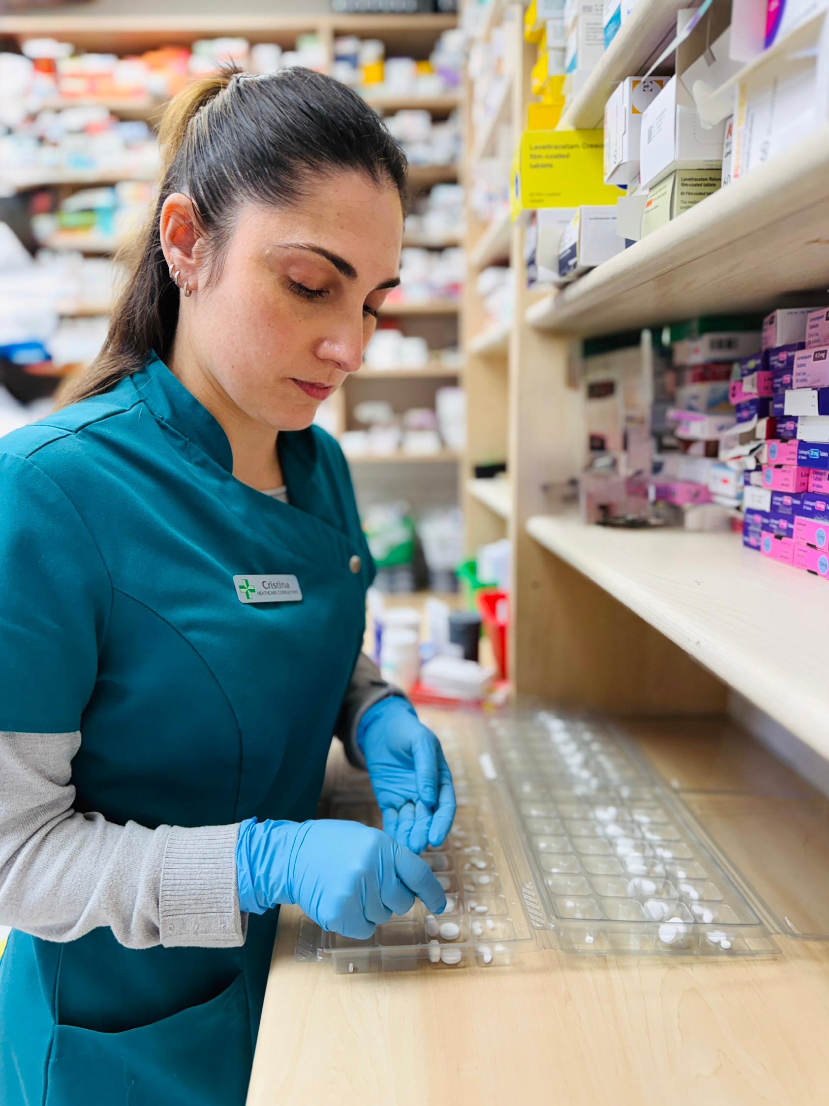 Husbands Pharmacy staff member
